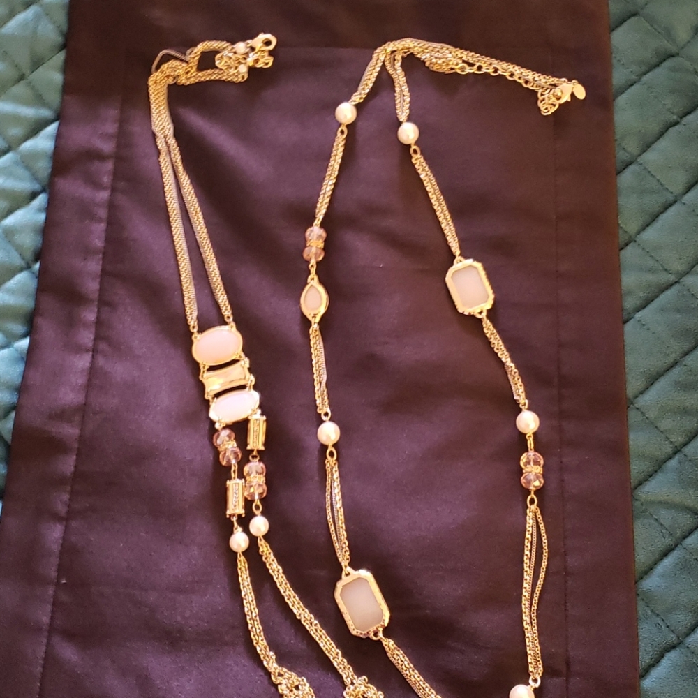 Two Chico gold with baby pink stones